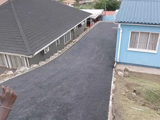TAR AND PAVING DRIVEWAY
