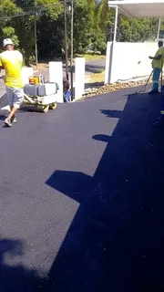 TAR AND PAVING DRIVEWAY