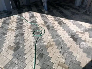 TAR AND PAVING DRIVEWAY