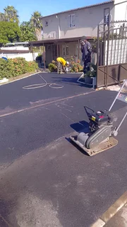 TAR AND PAVING DRIVEWAY