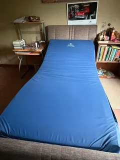 Electronic adjustable home care bed