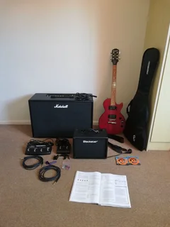 Electric guitar and amps along with essentials