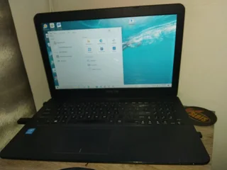 Asus i3 with 12gig ram and 1000gig hard drive.