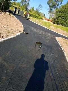 TARRING DRIVEWAYS  &amp;  RETAINING WALLS