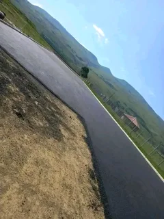 TARRING DRIVEWAYS  &amp;  RETAINING WALLS