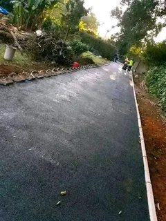 TARRING DRIVEWAYS  &amp; RETAINING WALLS