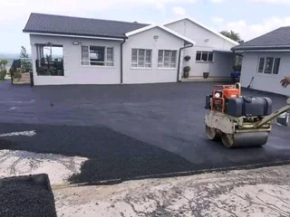 TARRING DRIVEWAYS  &amp; RETAINING WALLS