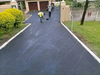 TARRING DRIVEWAYS  &amp;  RETAINING WALLS