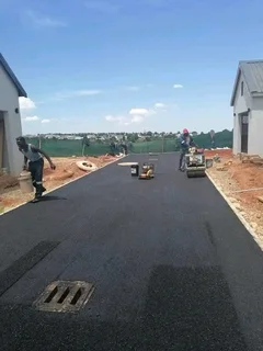 TARRING DRIVEWAYS  &amp;  RETAINING WALLS