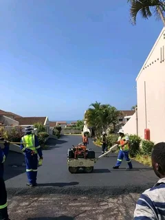 TAR DRIVEWAYS  &amp;  RETAINING WALLS