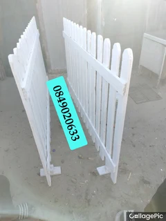 Clean white picket fencing