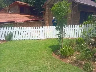 Clean white picket fencing for gates, swimming pools