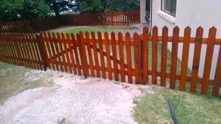 Clean white picket fencing for gates, swimming pools, fencing yards and garden flowers, installation