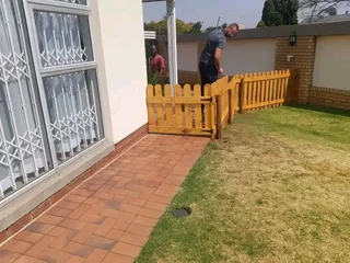 Clean white picket fencing for gates, swimming pools, fencing yards and garden flowers, installation