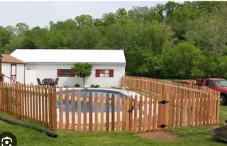 Clean white picket fencing