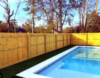 Clean white picket fencing