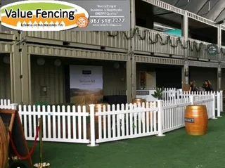 Clean white picket fencing