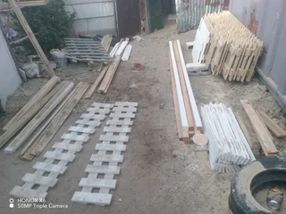 Clean white picket fencing