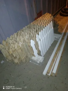 Clean white picket fencing