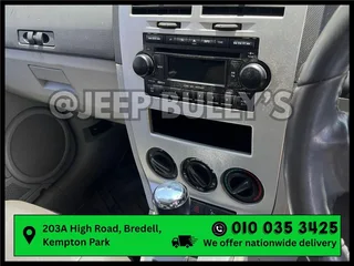 Stripping an Automatic Dodge Caliber At Jeep Bully's – Infotainment System Ready To Go