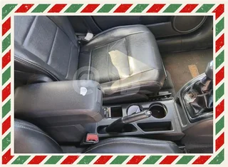 Patriot Manual 2.4 Centre Console and Cup Holders Available At Jeep Bully's