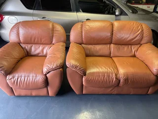 Tan leather lounge suite