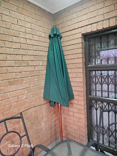 8pc outdoor glass top metal patio set.