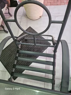 8pc outdoor glass top metal patio set.