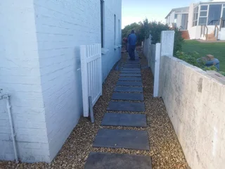 13MM AND 19MM BROWN AND GREY DECORATIVE PEBBLE STONES#BLOCK AND STONE#SUPPLY AND INSTALLATION.