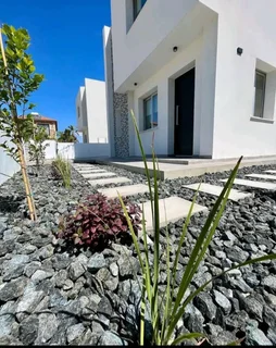 13MM AND 19MM BROWN AND GREY DECORATIVE PEBBLE STONES#SUPPLY AND INSTALLATION.