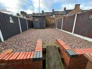 PAVING TURF BACKYARD