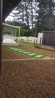 Pebblestones Slabs n Turf Paving