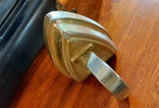 Metal iron door stop brass ironing vintage antique piece ornament