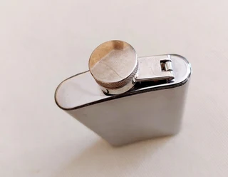 Hip flask stainless steel used 1980s container