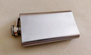 Hip flask stainless steel used 1980s container