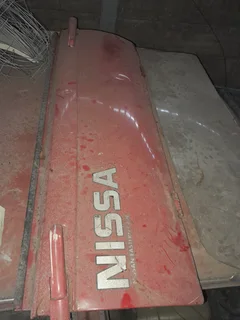 Nissan Champ Tail gate R1200neg &amp; passenger fender R350neg