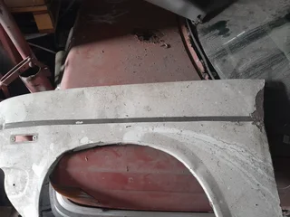 Nissan Champ Tail gate R1200neg &amp; passenger fender R350neg