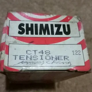 Timing belt tensioner