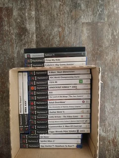 R2000. PlayStation 2 with 22 games, 2 controllers