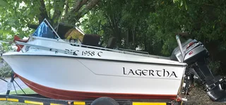 Boat + 2 x 60hp Mariners Trim & Tilt