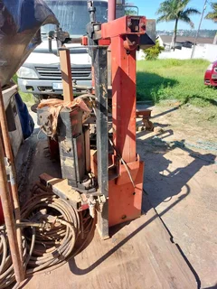 2x CORGHI TYRE CHANGER AND 1x BALCO WHEEL BALANCER