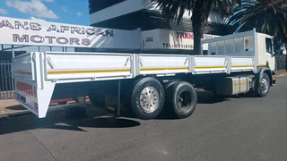 Scania P410 16ton tag axle dropside for sale