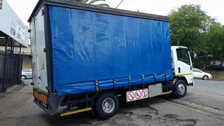 Isuzu npr400 tautliner for sale