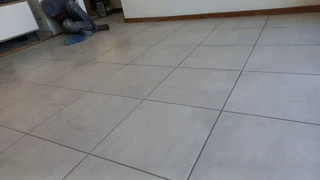 Tiling, painting and paving