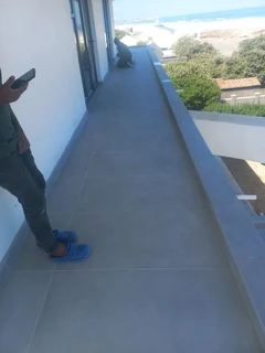 Tiling, painting and paving