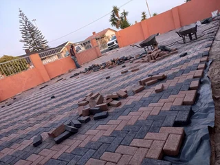 Tiling, painting and paving