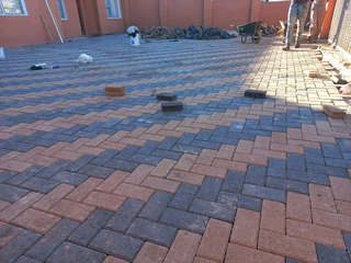 Tiling, painting and paving