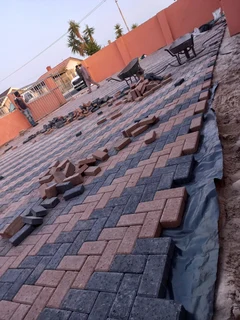 Tiling, painting and paving