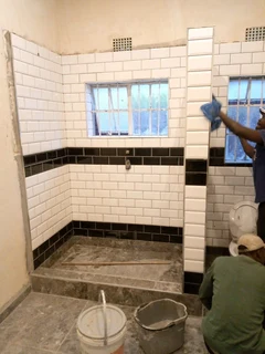 Tiling, painting and paving