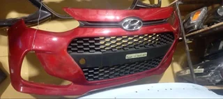 Hyundai i10 grand front bumper available for sale .
